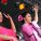 A photo of women dancing at Refugee Week Wales.