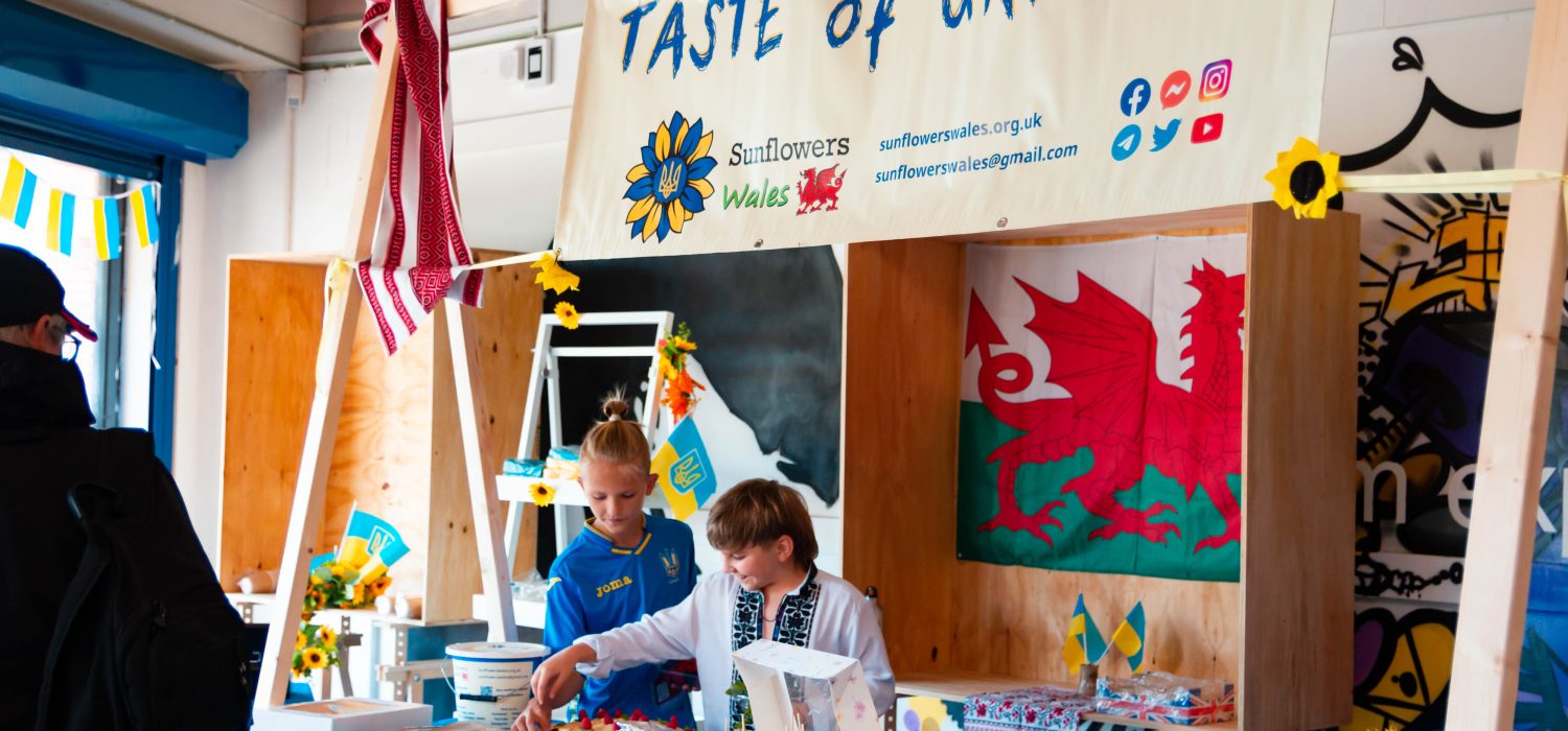 Children looking after a food stall on Ukrainian Independence Day.